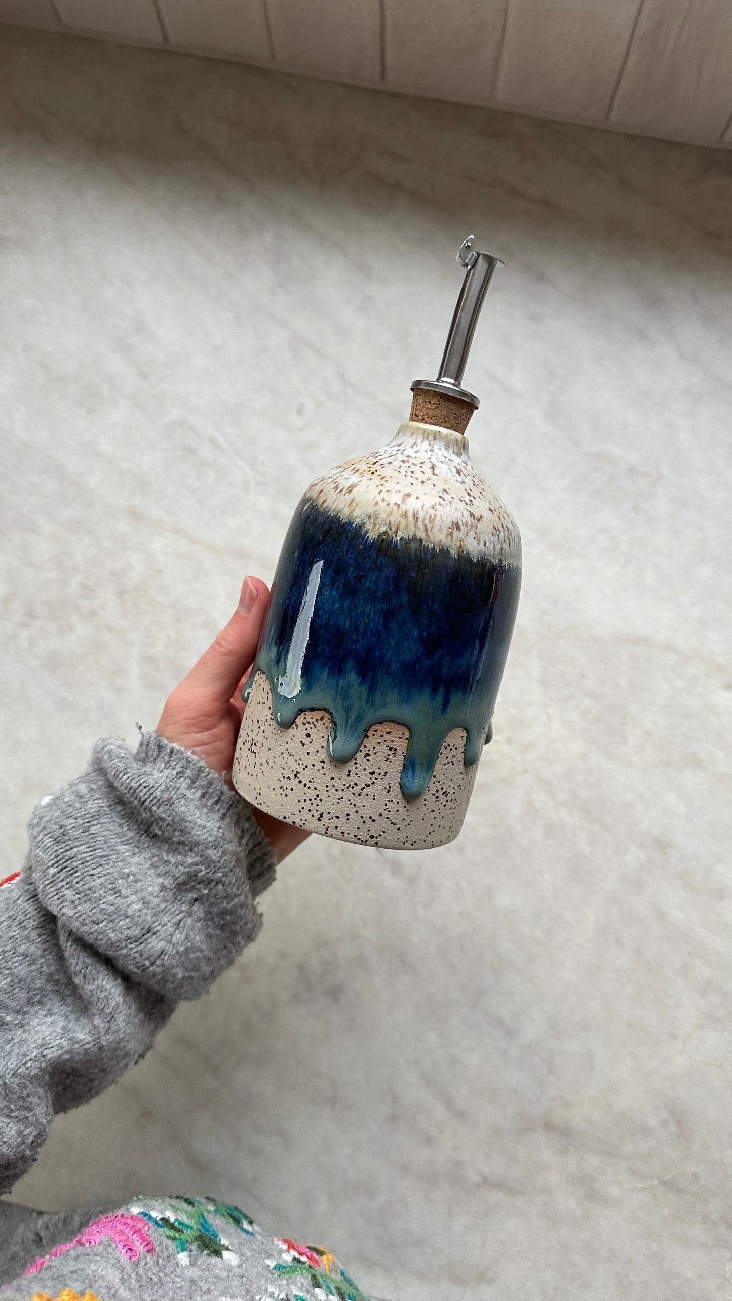 Bouteille d'huile bleu myrtille