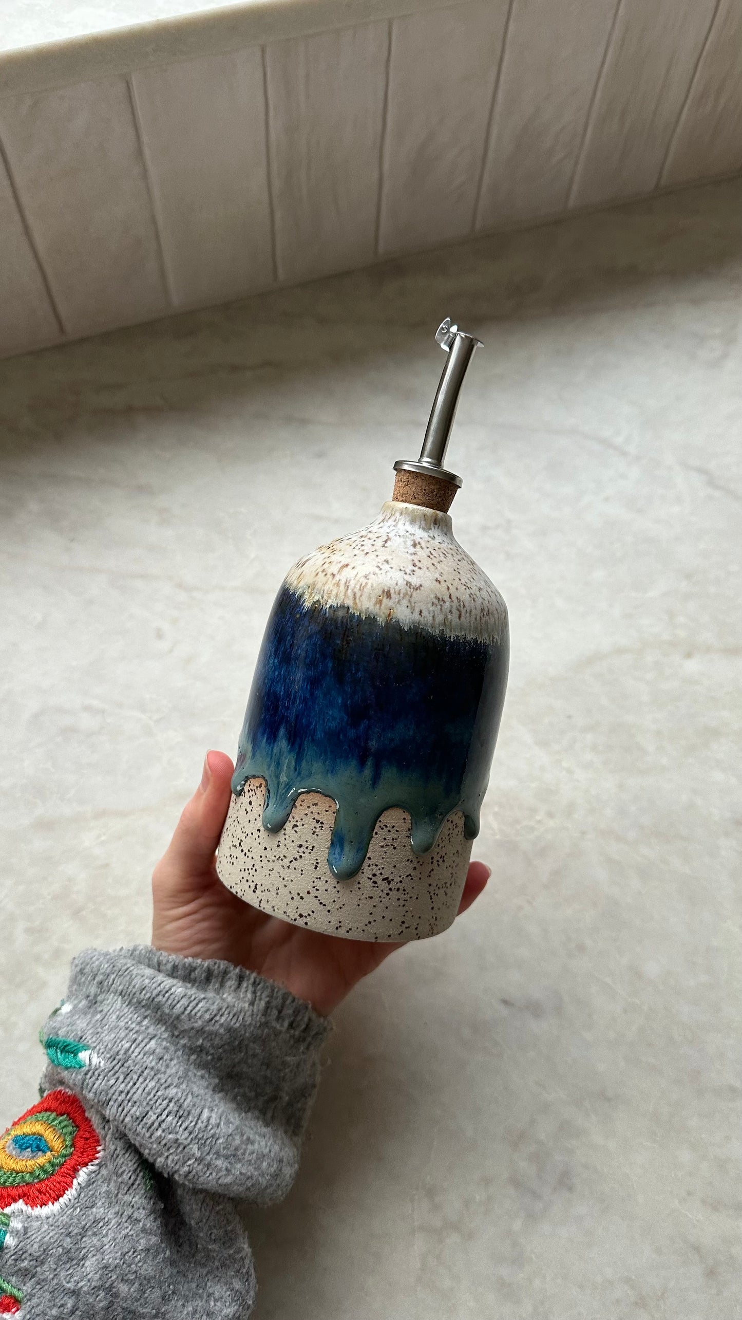 Bouteille d'huile bleu myrtille