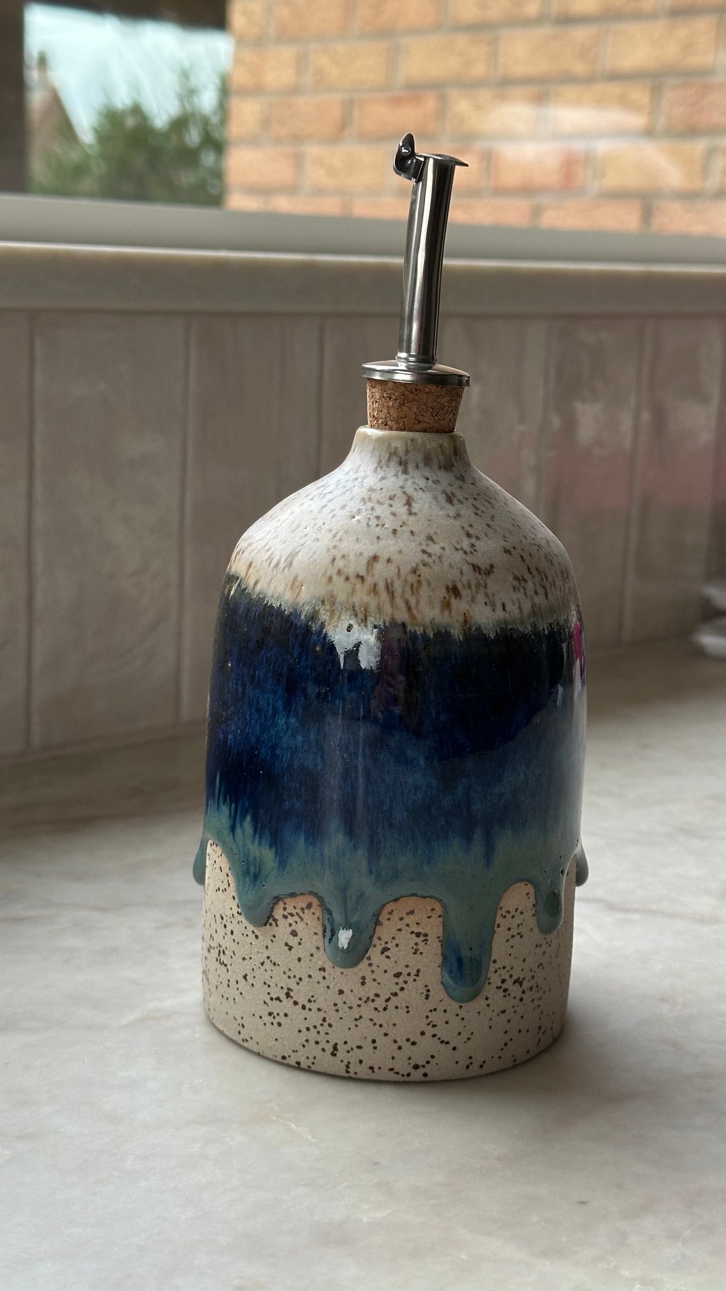 Bouteille d'huile bleu myrtille